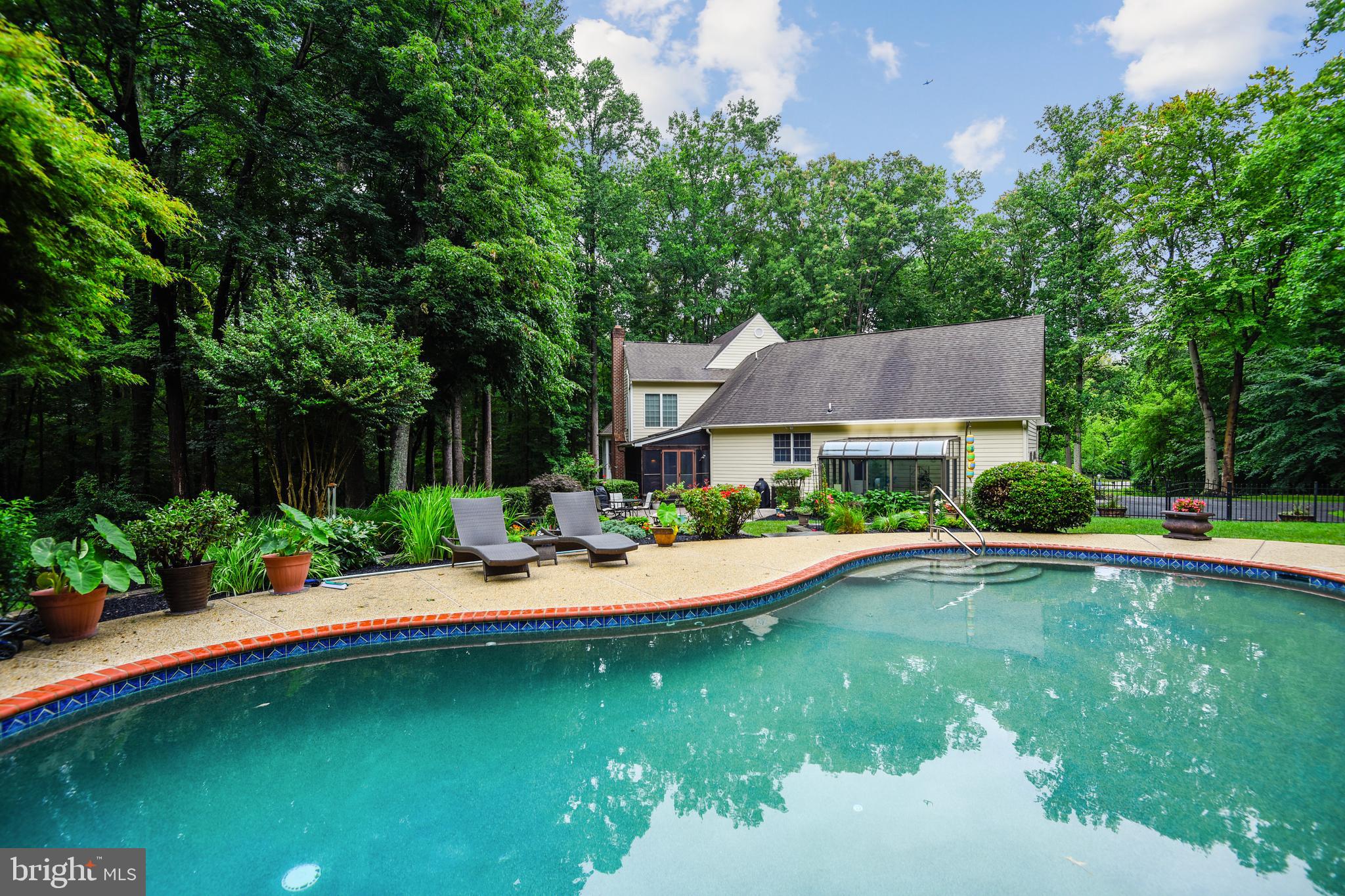 54 Colony Crossing Edgewater, MD 21037 - Photo 41 of 49 Beautiful pool surrounded by patio