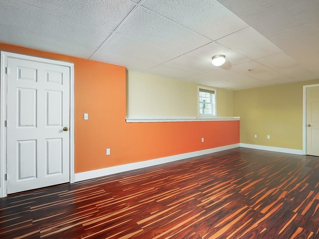 24 Village Road Pepperell, MA 01463 - Photo 37 of 40 a view of empty room with wooden floor