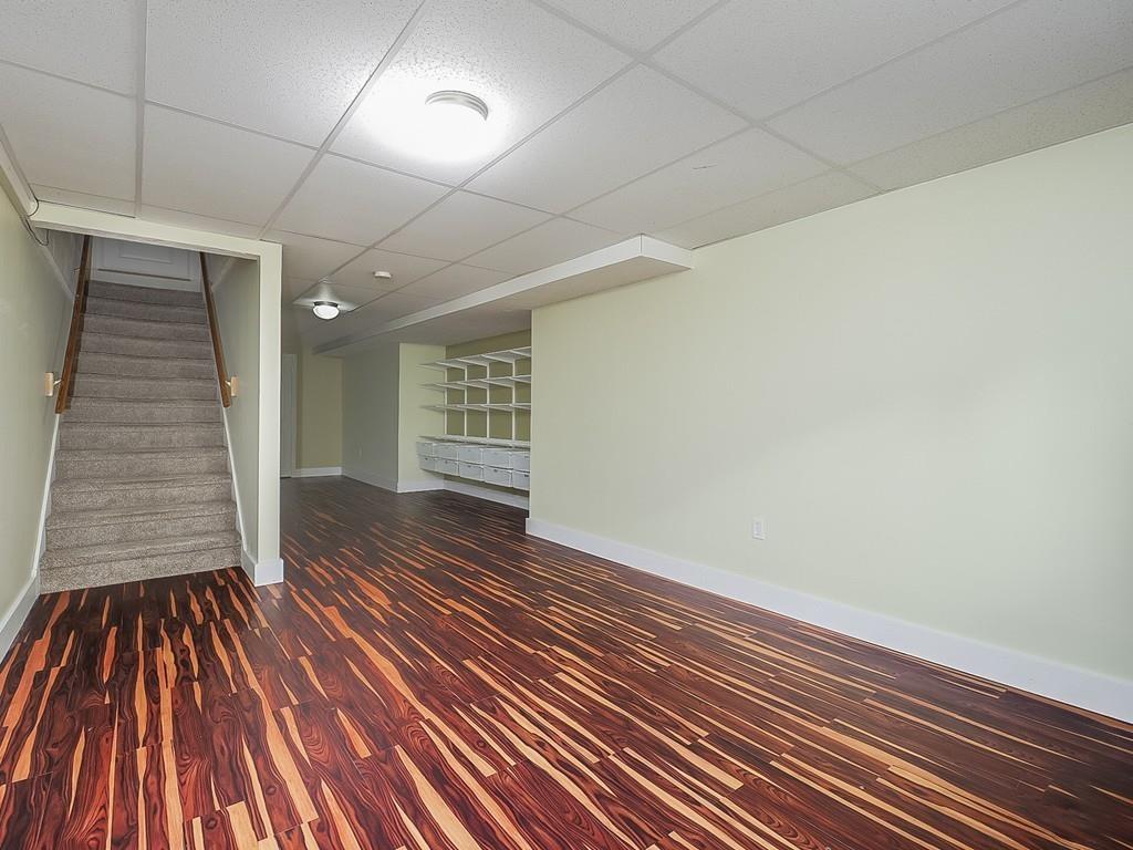 24 Village Road Pepperell, MA 01463 - Photo 38 of 40 a view of wooden floor in a room