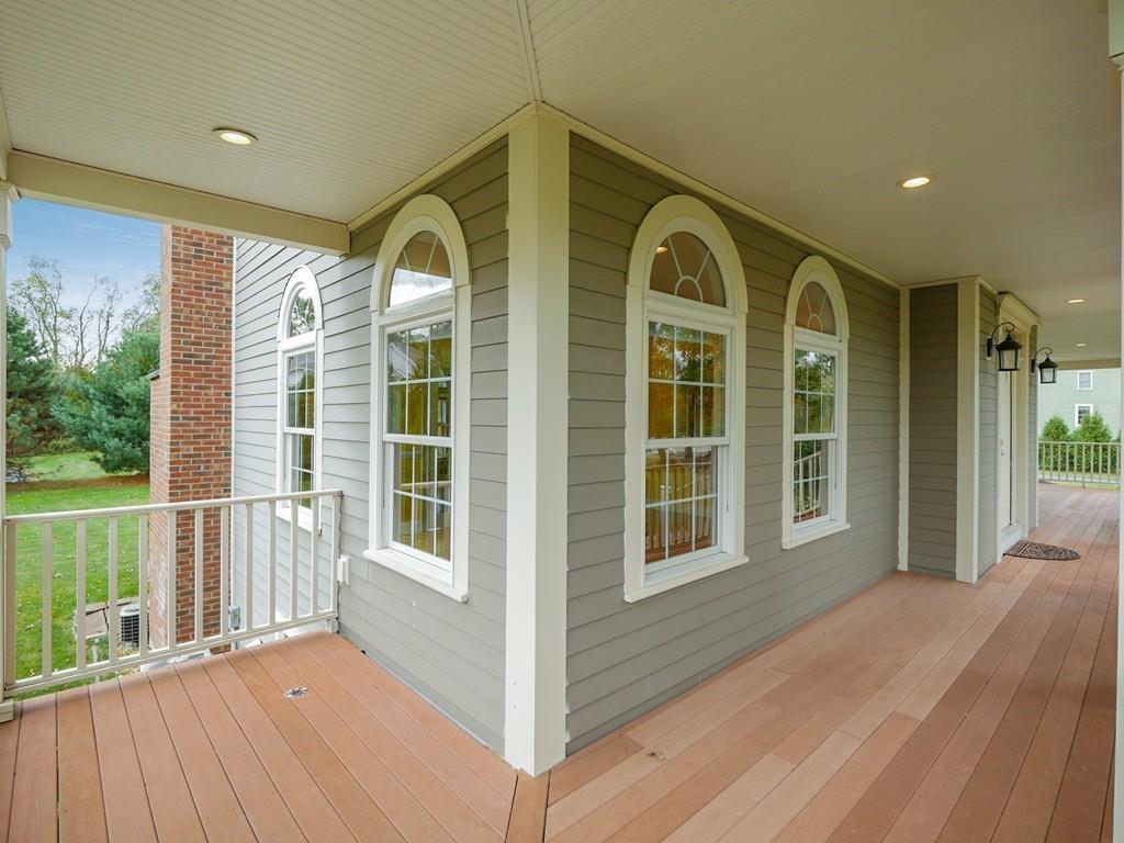 24 Village Road Pepperell, MA 01463 - Photo 4 of 40 a view of a house with a porch