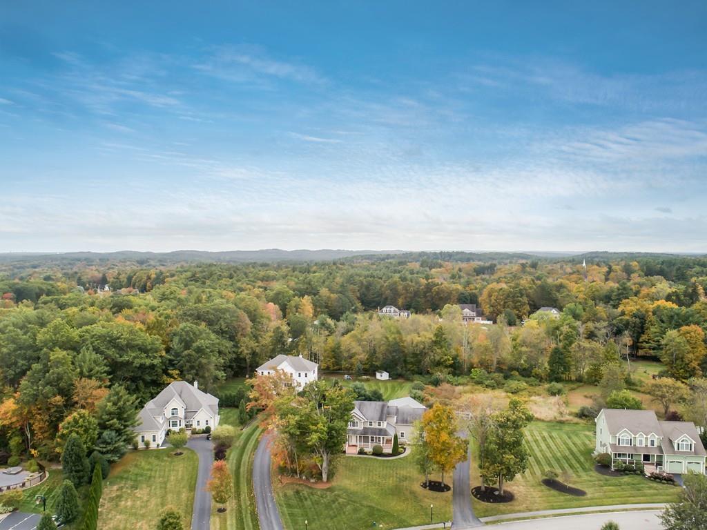 24 Village Road Pepperell, MA 01463 - Photo 9 of 40 an aerial view of multiple house