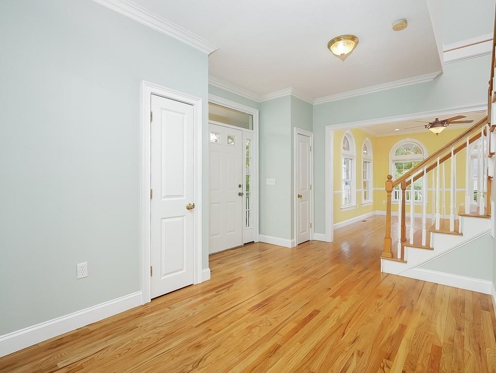 24 Village Road Pepperell, MA 01463 - Photo 10 of 40 a view of a livingroom with wooden floor