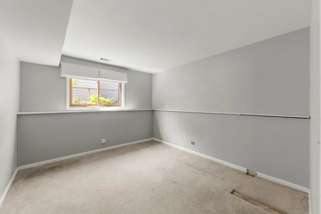 an empty room with window