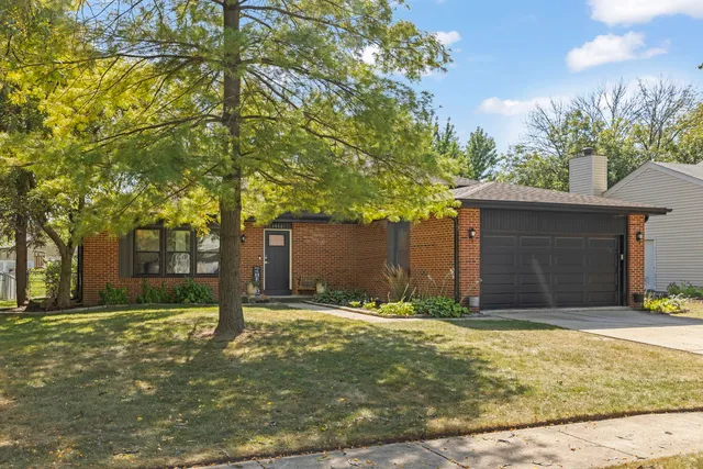 a house with trees in the background