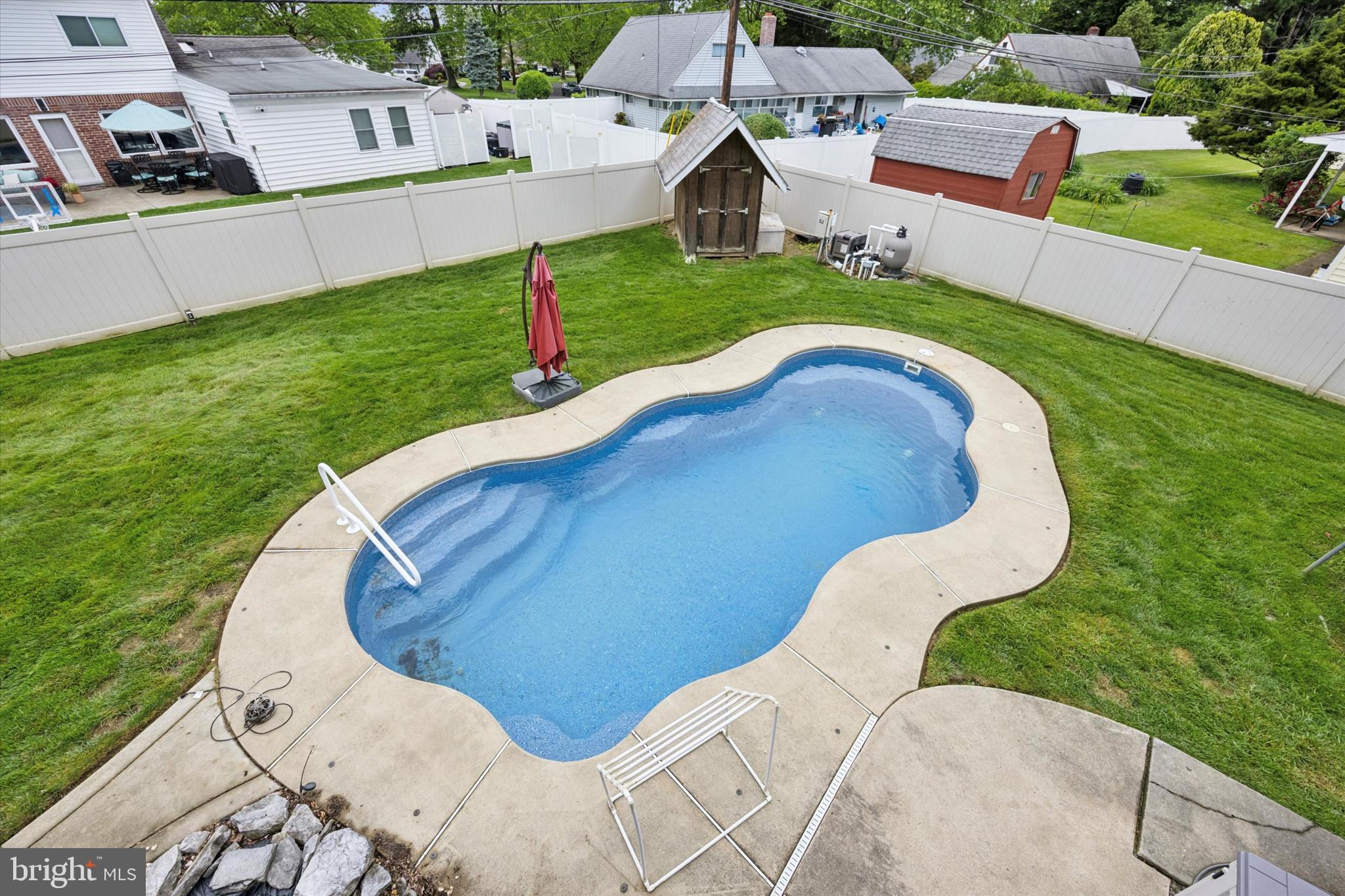 39 Smoketree Road Levittown, PA 19056 - Photo 20 of 24 In-ground heated saltwater pool