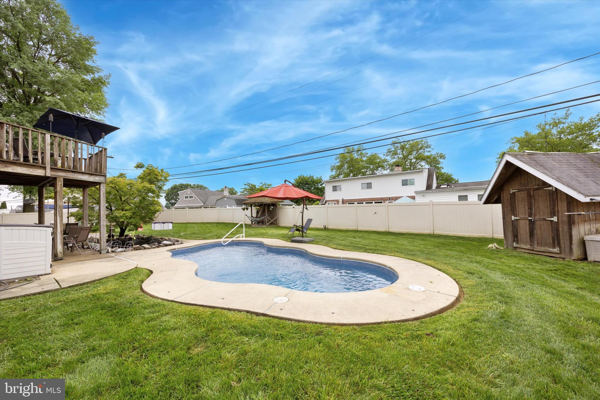 39 Smoketree Road Levittown, PA 19056 - Photo 21 of 24 In-ground heated saltwater pool