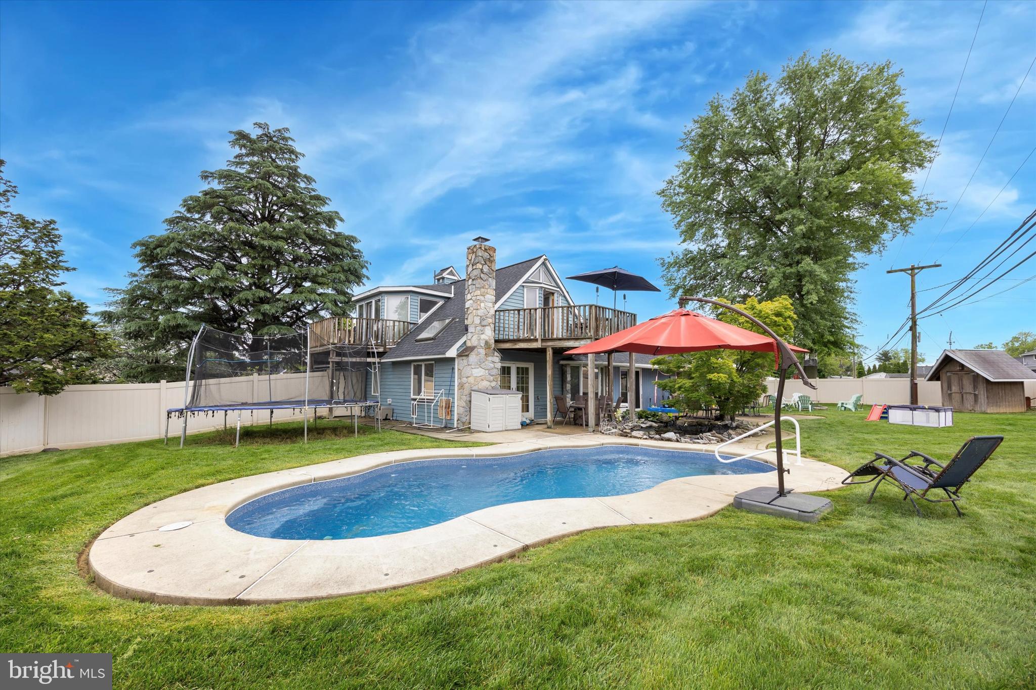 39 Smoketree Road Levittown, PA 19056 - Photo 23 of 24 In-ground heated saltwater pool
