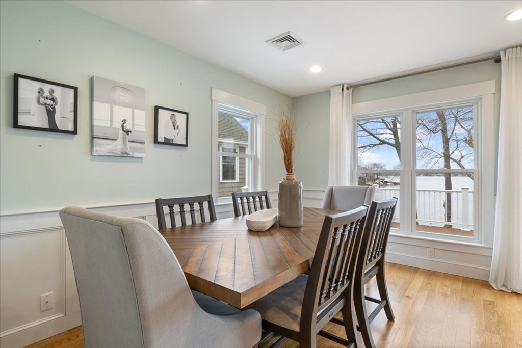 20 Bates Point Road Webster, MA 01570 - Photo 14 of 32 a view of a dining room with furniture window and wooden floor