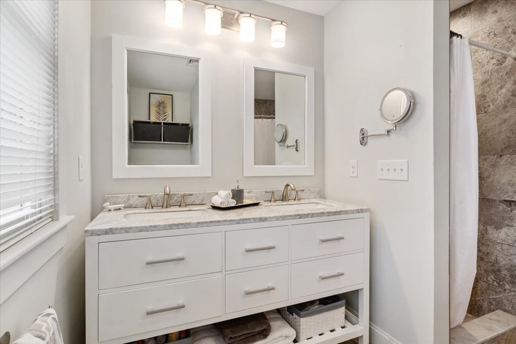 20 Bates Point Road Webster, MA 01570 - Photo 19 of 32 a bathroom with a granite countertop sink mirror and