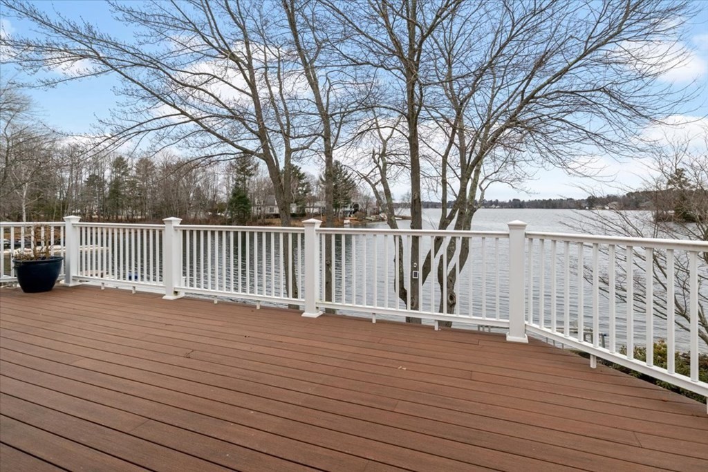 20 Bates Point Road Webster, MA 01570 - Photo 24 of 32 a view of deck with wooden floor and fence and a trees