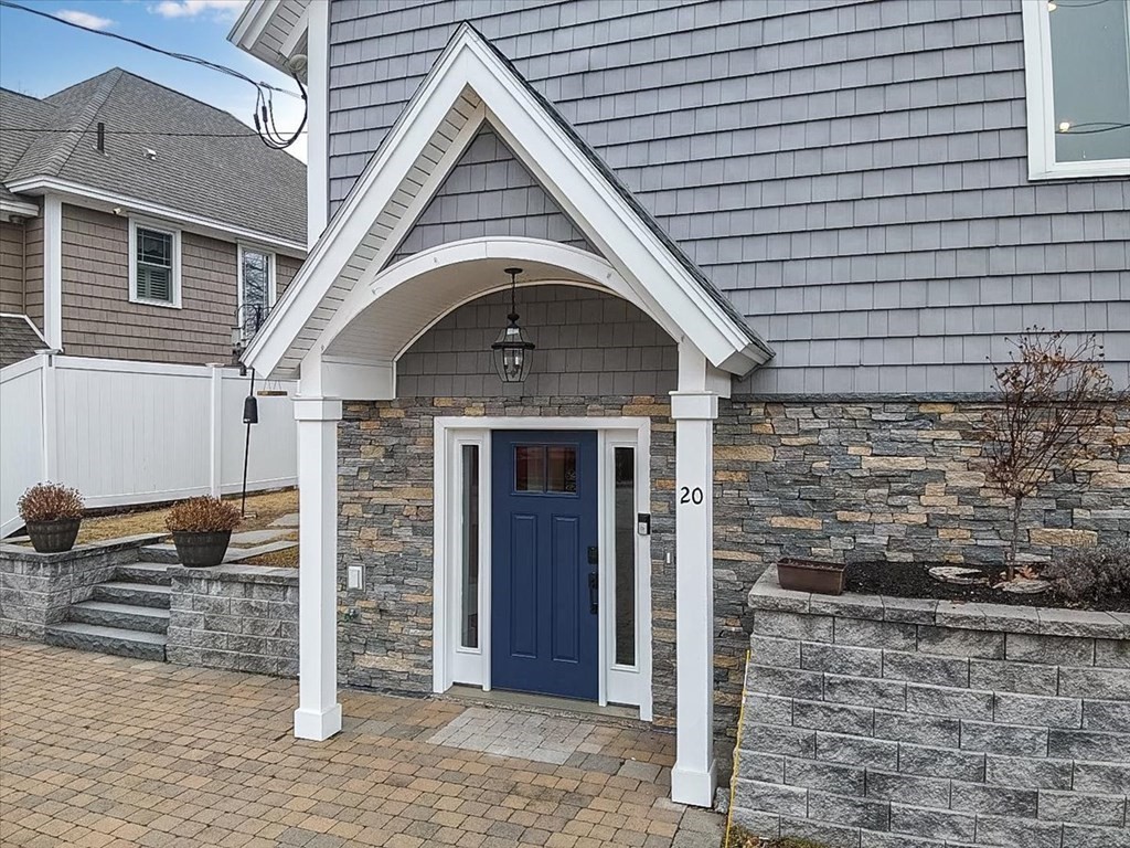 20 Bates Point Road Webster, MA 01570 - Photo 7 of 32 a front view of a house with a door