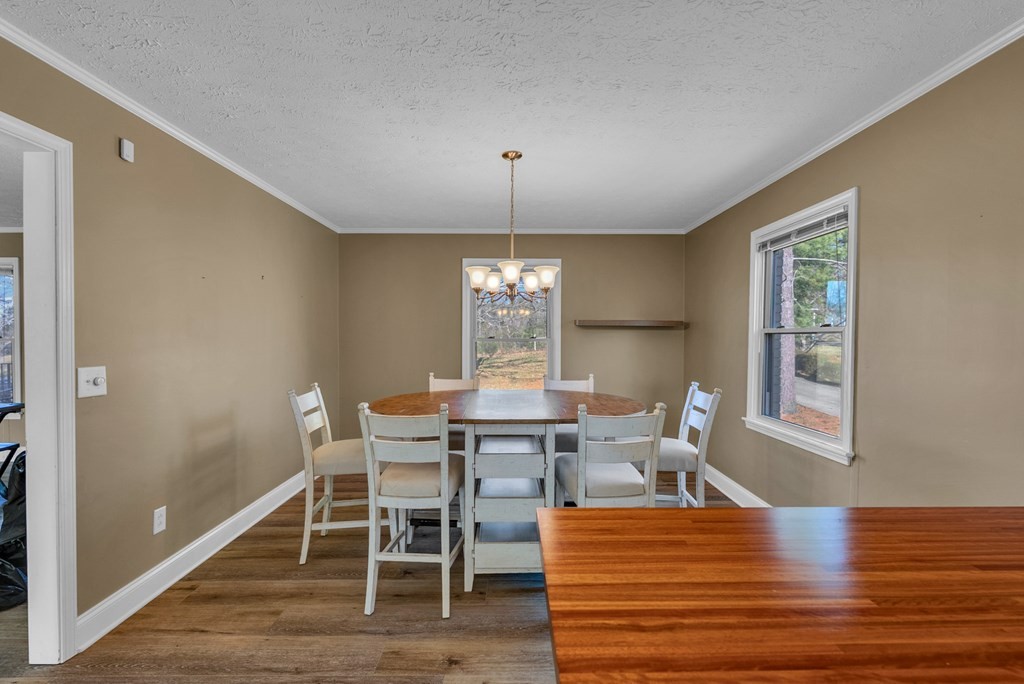 1868 Herbert Garrett Road Cookeville, TN 38506 - Photo 11 of 47 a view of a dining room with furniture window and wooden floor