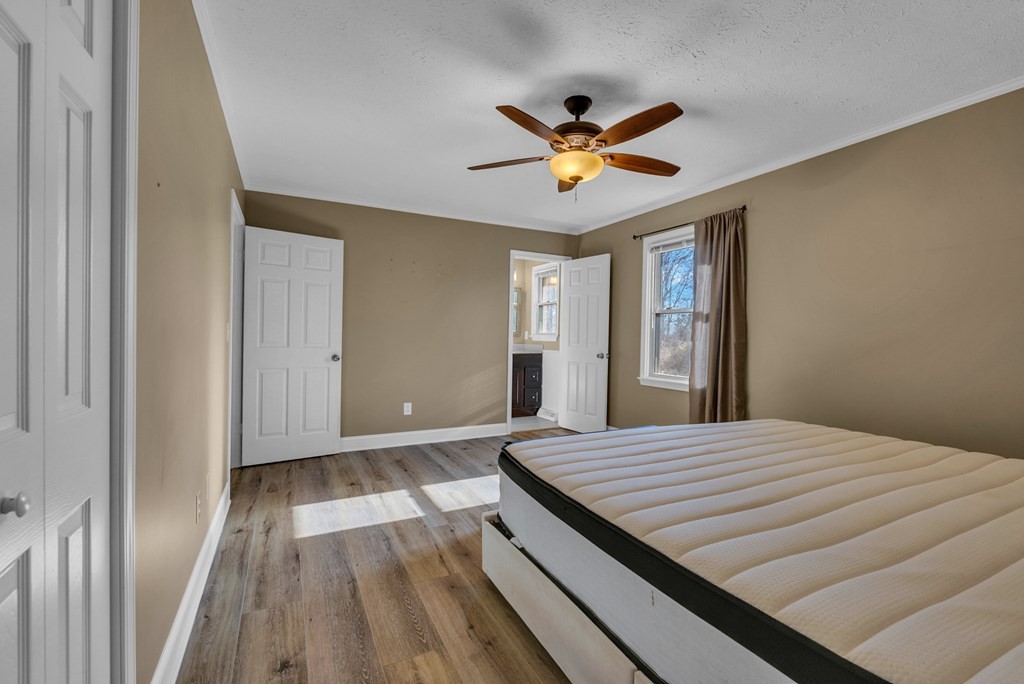 1868 Herbert Garrett Road Cookeville, TN 38506 - Photo 13 of 47 a bedroom with a bed and a window