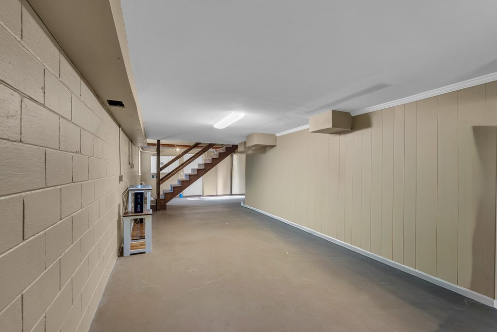 1868 Herbert Garrett Road Cookeville, TN 38506 - Photo 22 of 47 a view of an empty room with stairs