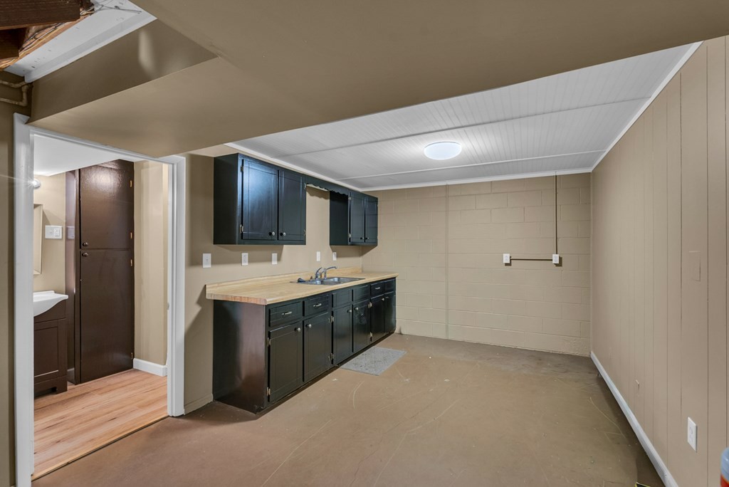 1868 Herbert Garrett Road Cookeville, TN 38506 - Photo 25 of 47 a bathroom with a sink and mirror