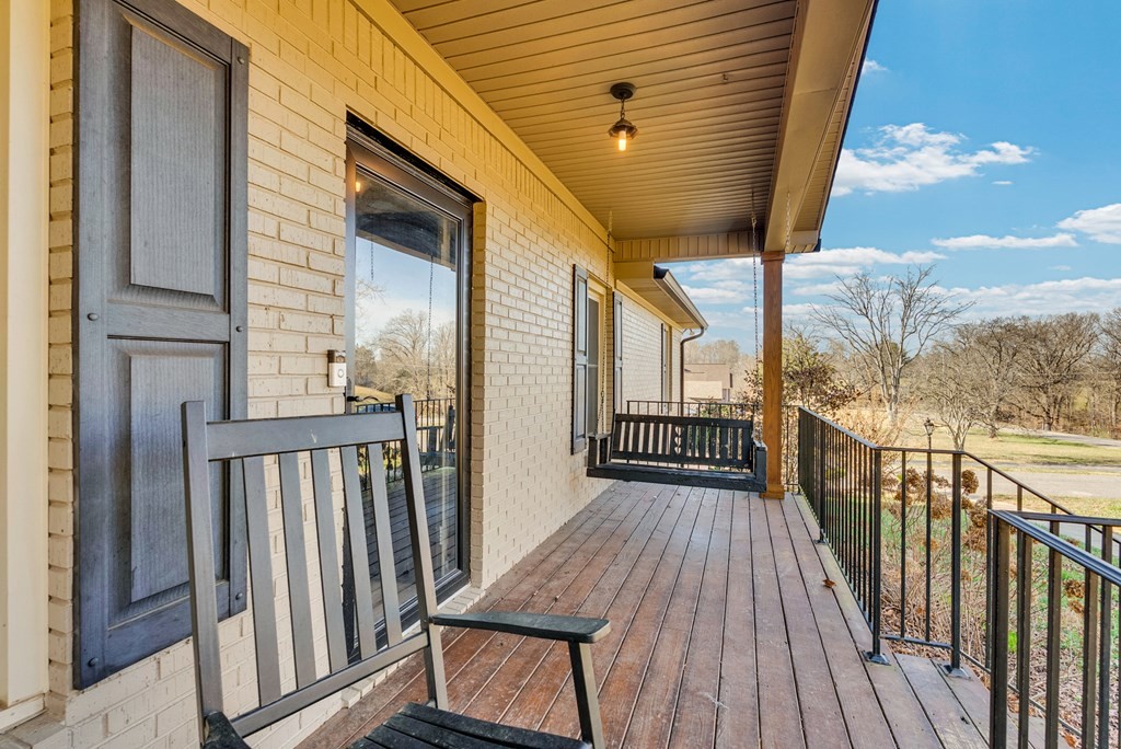 1868 Herbert Garrett Road Cookeville, TN 38506 - Photo 3 of 47 a view of a balcony with wooden floor
