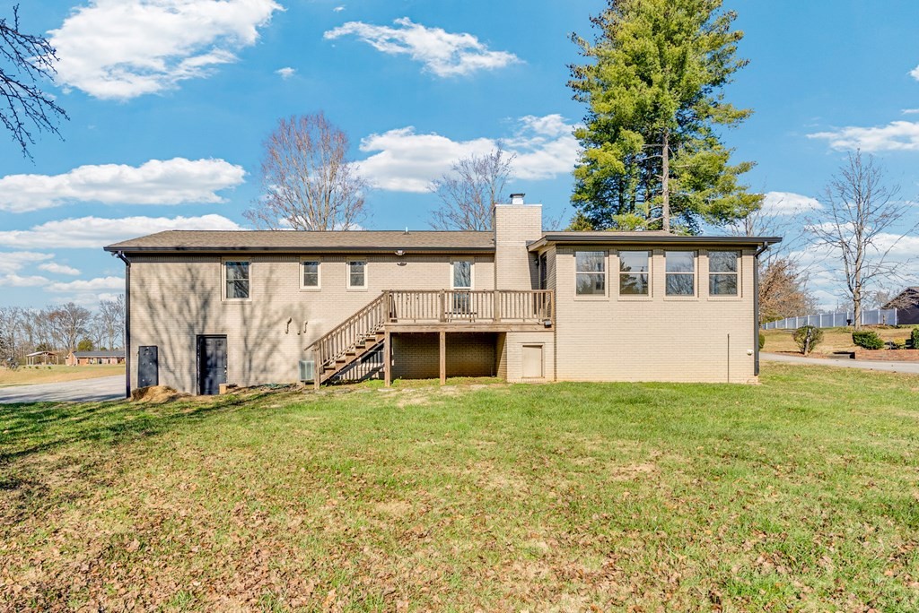 1868 Herbert Garrett Road Cookeville, TN 38506 - Photo 32 of 47 a view of a house with backyard and garden