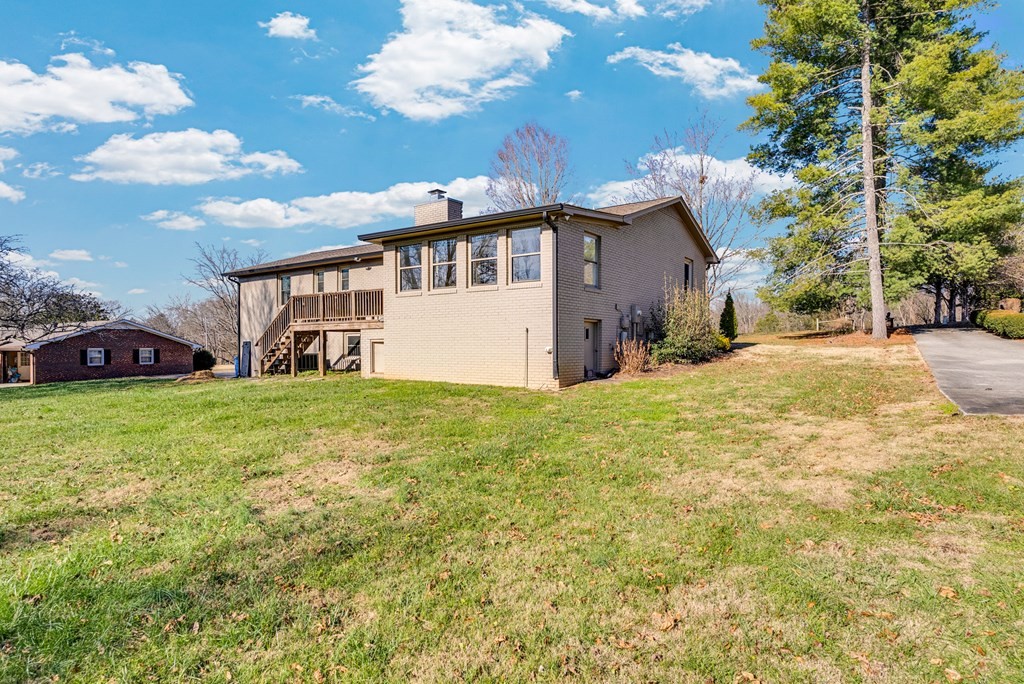 1868 Herbert Garrett Road Cookeville, TN 38506 - Photo 33 of 47 a front view of a house with garden