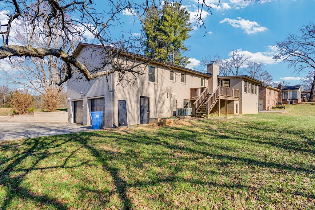 1868 Herbert Garrett Road Cookeville, TN 38506 - Photo 34 of 47 a view of a house with a yard