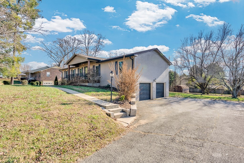 1868 Herbert Garrett Road Cookeville, TN 38506 - Photo 4 of 47 a view of a house with a yard