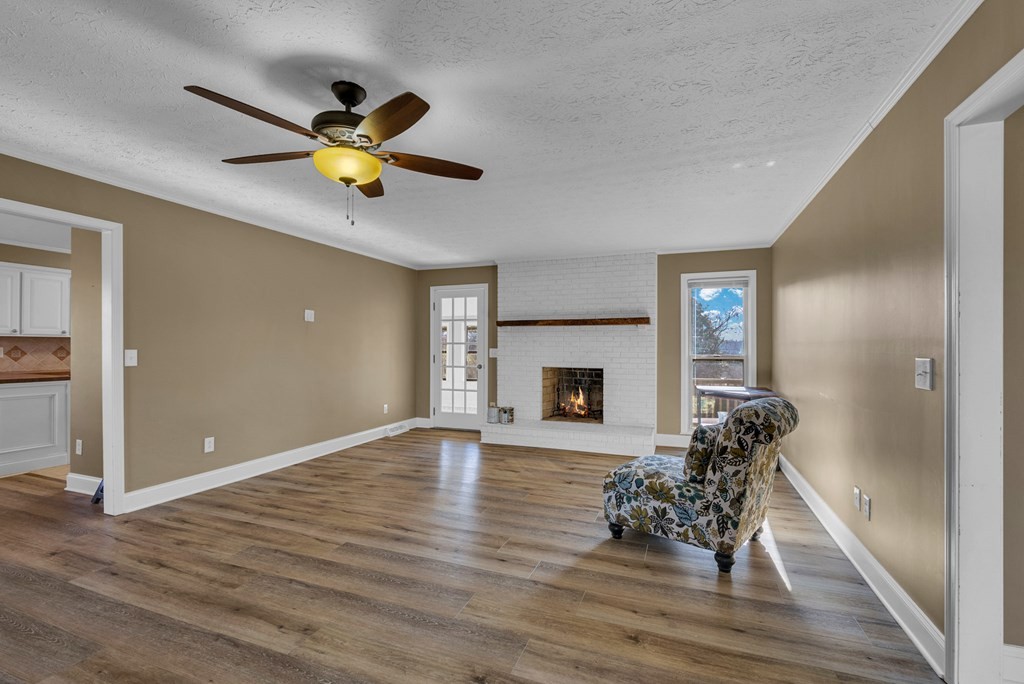 1868 Herbert Garrett Road Cookeville, TN 38506 - Photo 6 of 47 a living room with furniture and a fireplace
