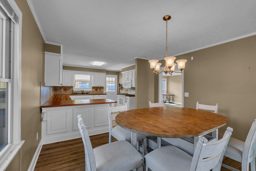1868 Herbert Garrett Road Cookeville, TN 38506 - Photo 7 of 47 a kitchen with a table and chairs in it