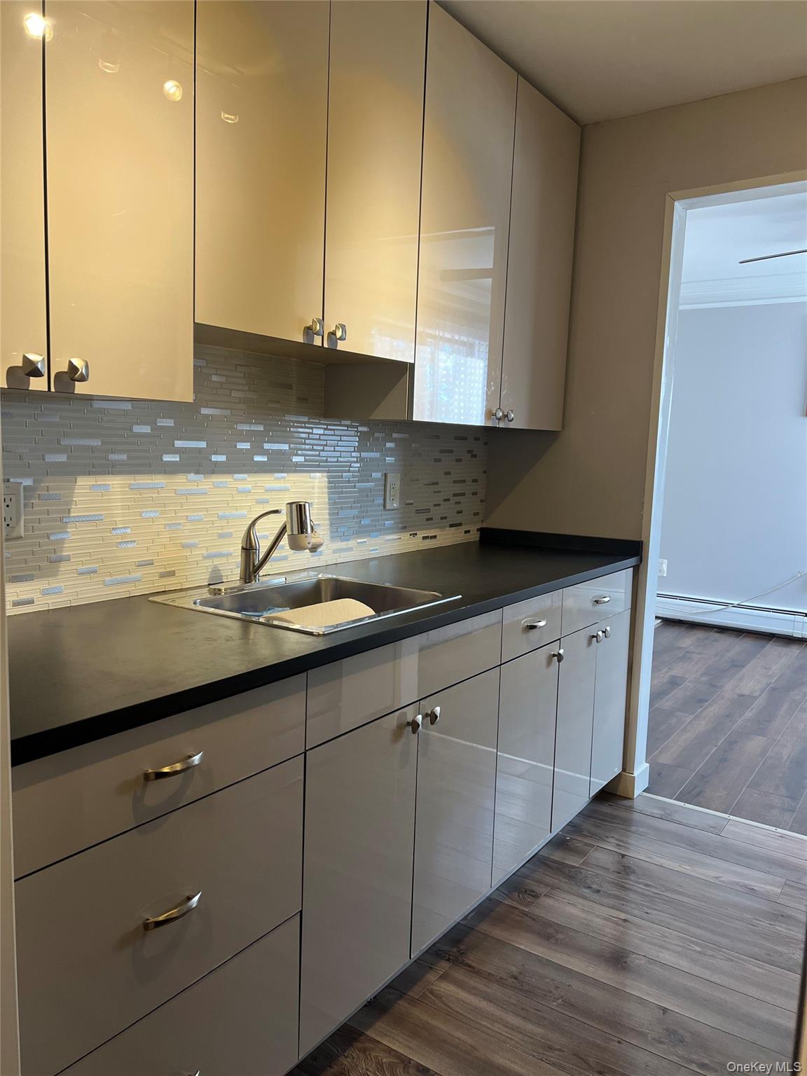 2 Secora Road, Unit 16 Monsey, NY 10952 - Photo 4 of 15 Renovated Kitchen with new countertops, cabinets, sink, backsplash and ceramic tile floor