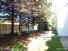 965 Ravine Terrace Court Rochester, MI 48307 - Photo 11 of 34 Mature Pine Trees