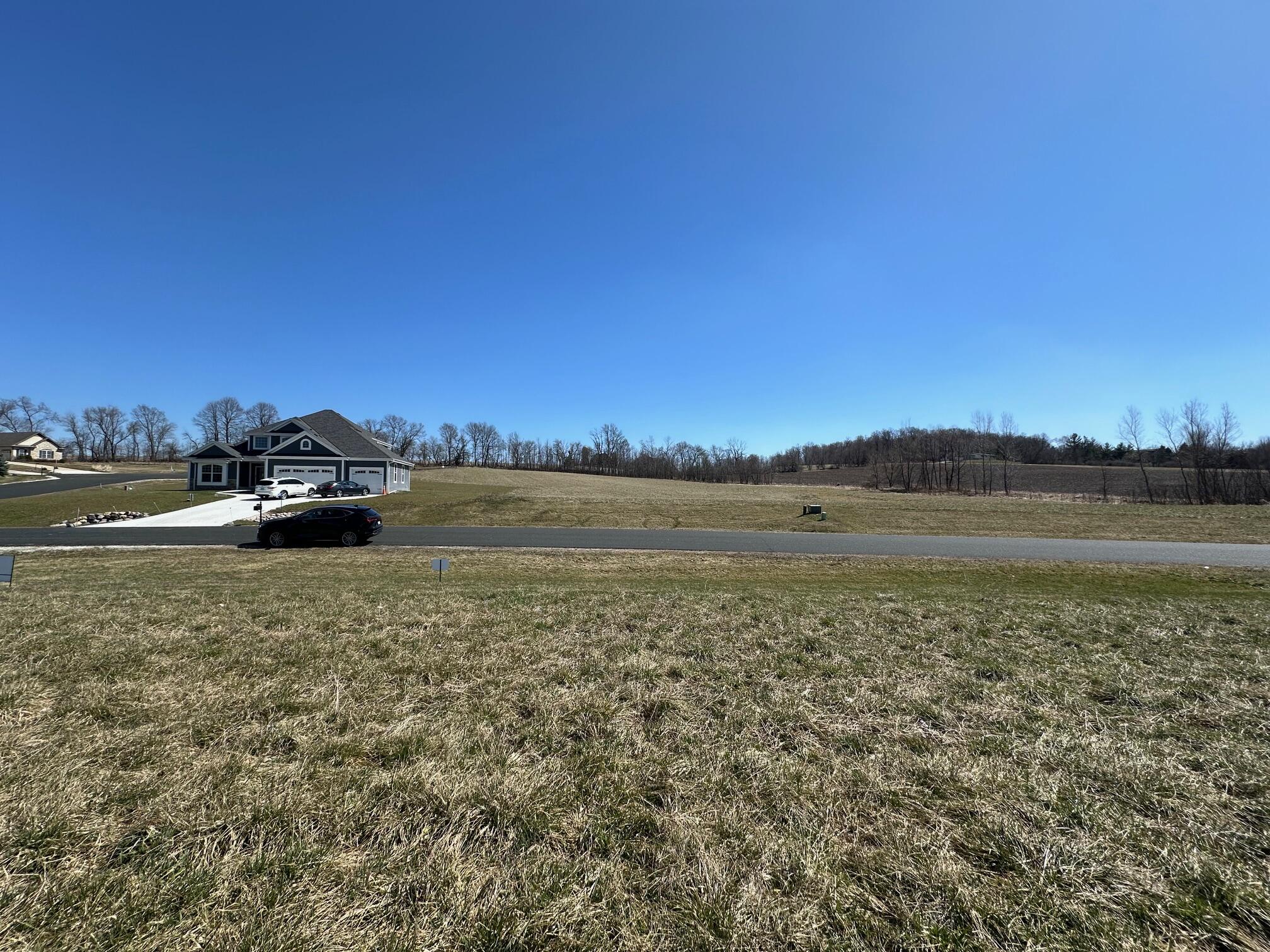 N979 Winds Way, Unit LT9 Ashippun, WI 53066 - Photo 7 of 12 LOT 9 LOOKING OUT