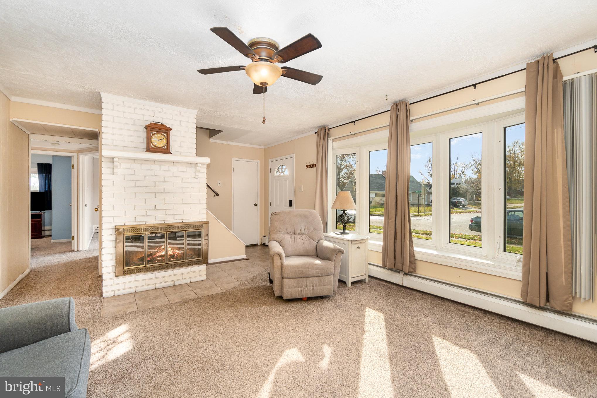 1509 Wogan Road York, PA 17404 - Photo 4 of 30 living room with wood burning fireplace