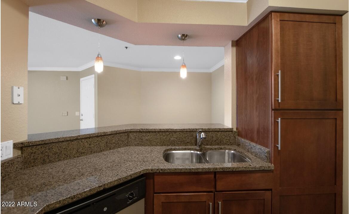 2025 East Campbell Avenue, Unit 156 Phoenix, AZ 85016 - Photo 7 of 23 a bathroom with a sink and a mirror