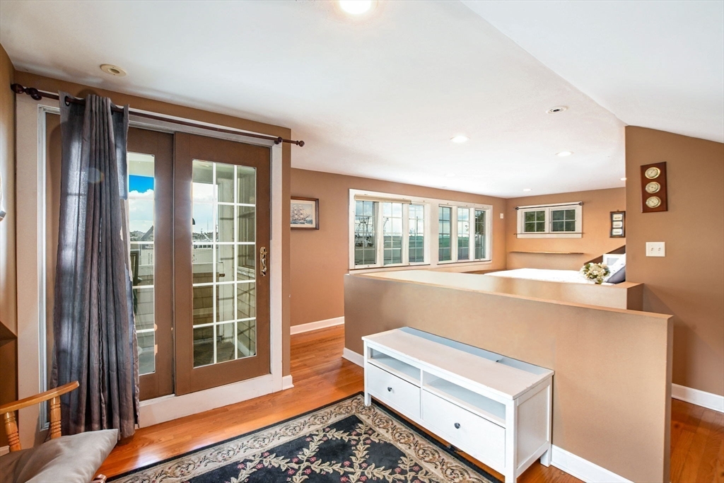 16 Middle Street Fairhaven, MA 02719 - Photo 12 of 34 a living room with furniture and a window
