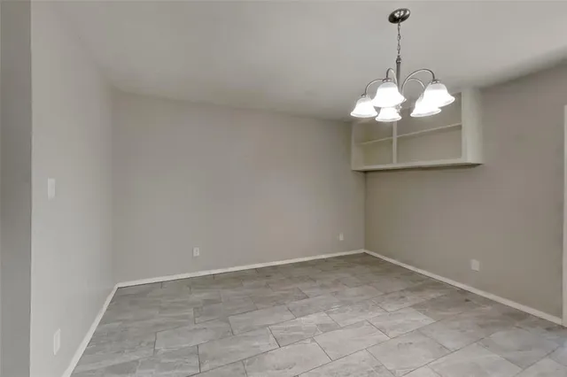 a view of a chandelier in a room