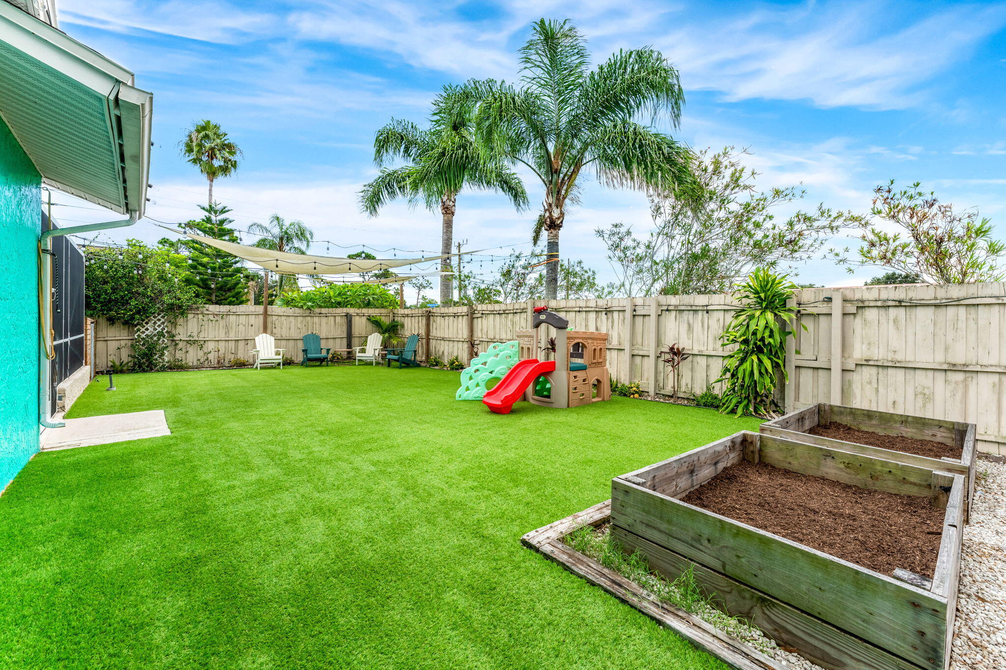 680 Mark Drive Melbourne, FL 32904 - Photo 22 of 36 a view of a backyard with swimming pool