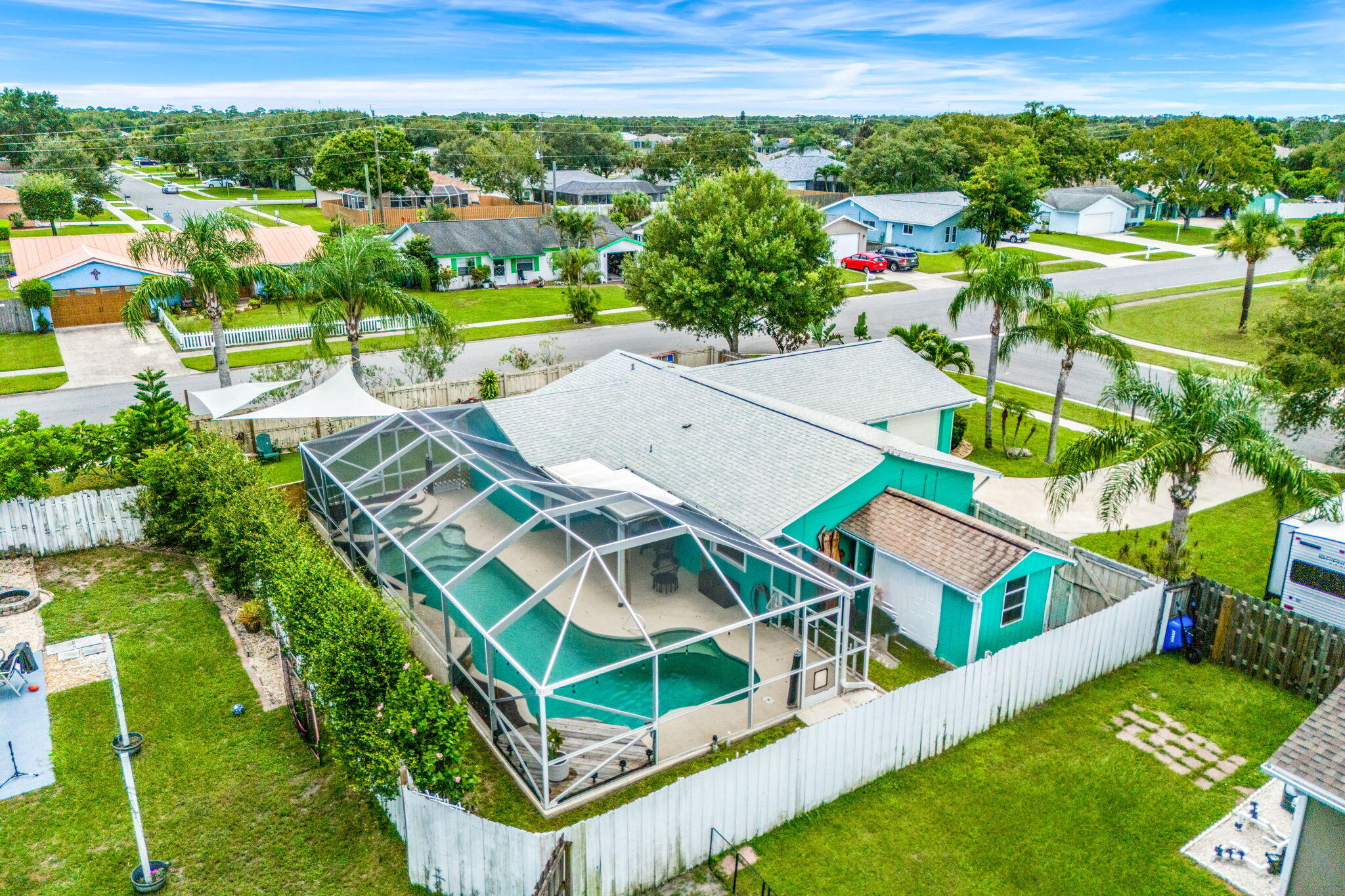 680 Mark Drive Melbourne, FL 32904 - Photo 24 of 36 an aerial view of multiple houses with a yard