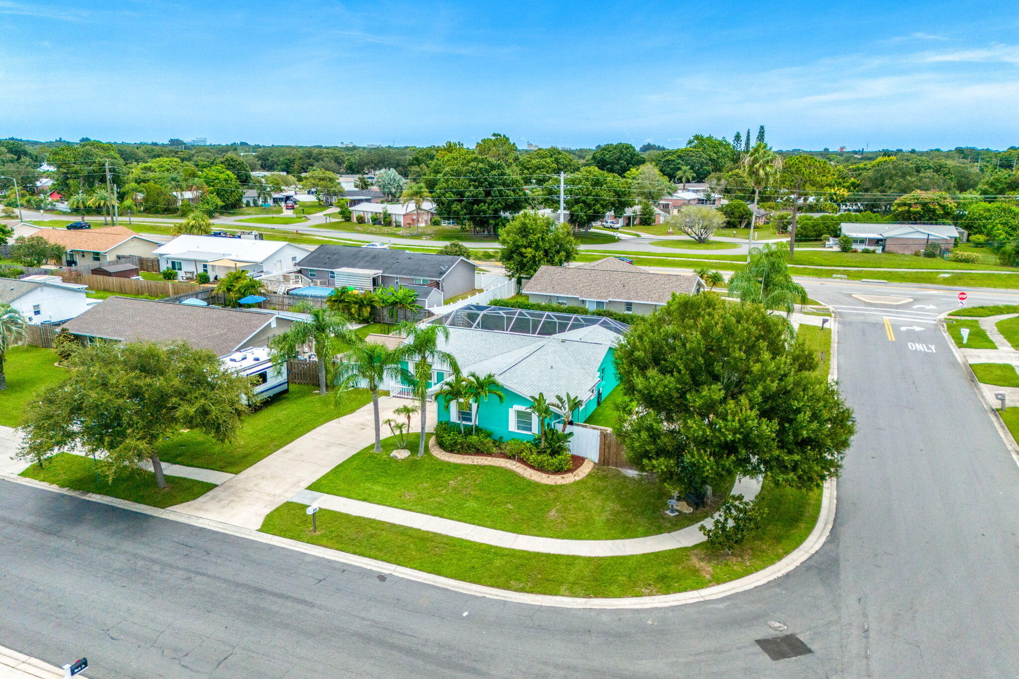 680 Mark Drive Melbourne, FL 32904 - Photo 31 of 36 a view of a swimming pool with a yard and lake view
