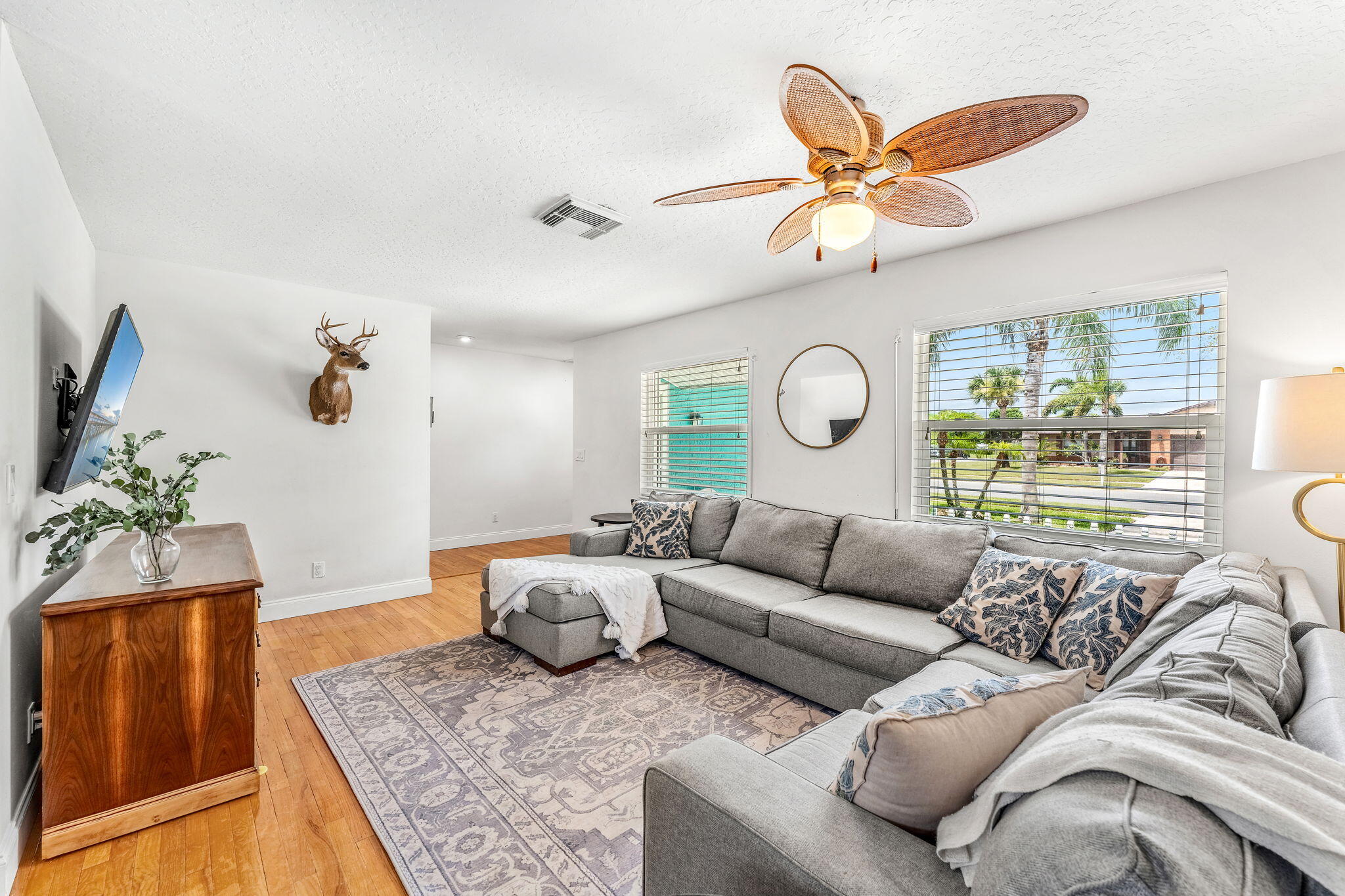 680 Mark Drive Melbourne, FL 32904 - Photo 5 of 36 a living room with furniture and a large window