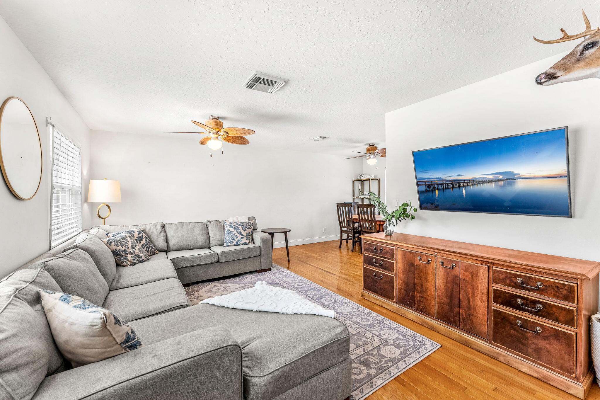 680 Mark Drive Melbourne, FL 32904 - Photo 6 of 36 a living room with furniture and a flat screen tv