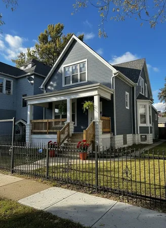 a front view of a house with a porch