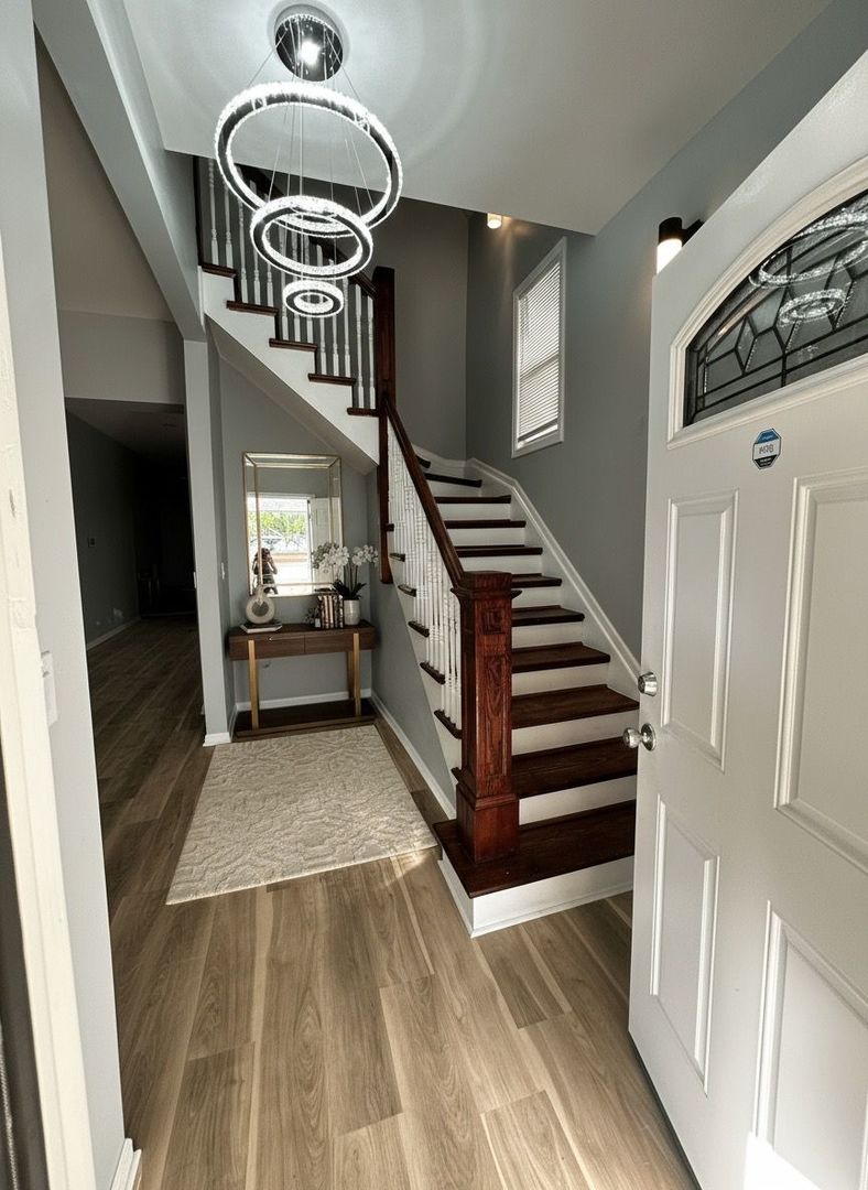 62 West 113th Street Chicago, IL 60628 - Photo 6 of 54 a view of a hallway with stairs