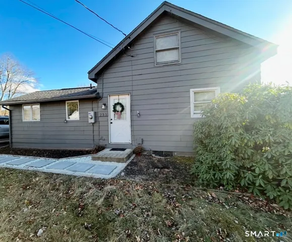 a view of a backyard of the house