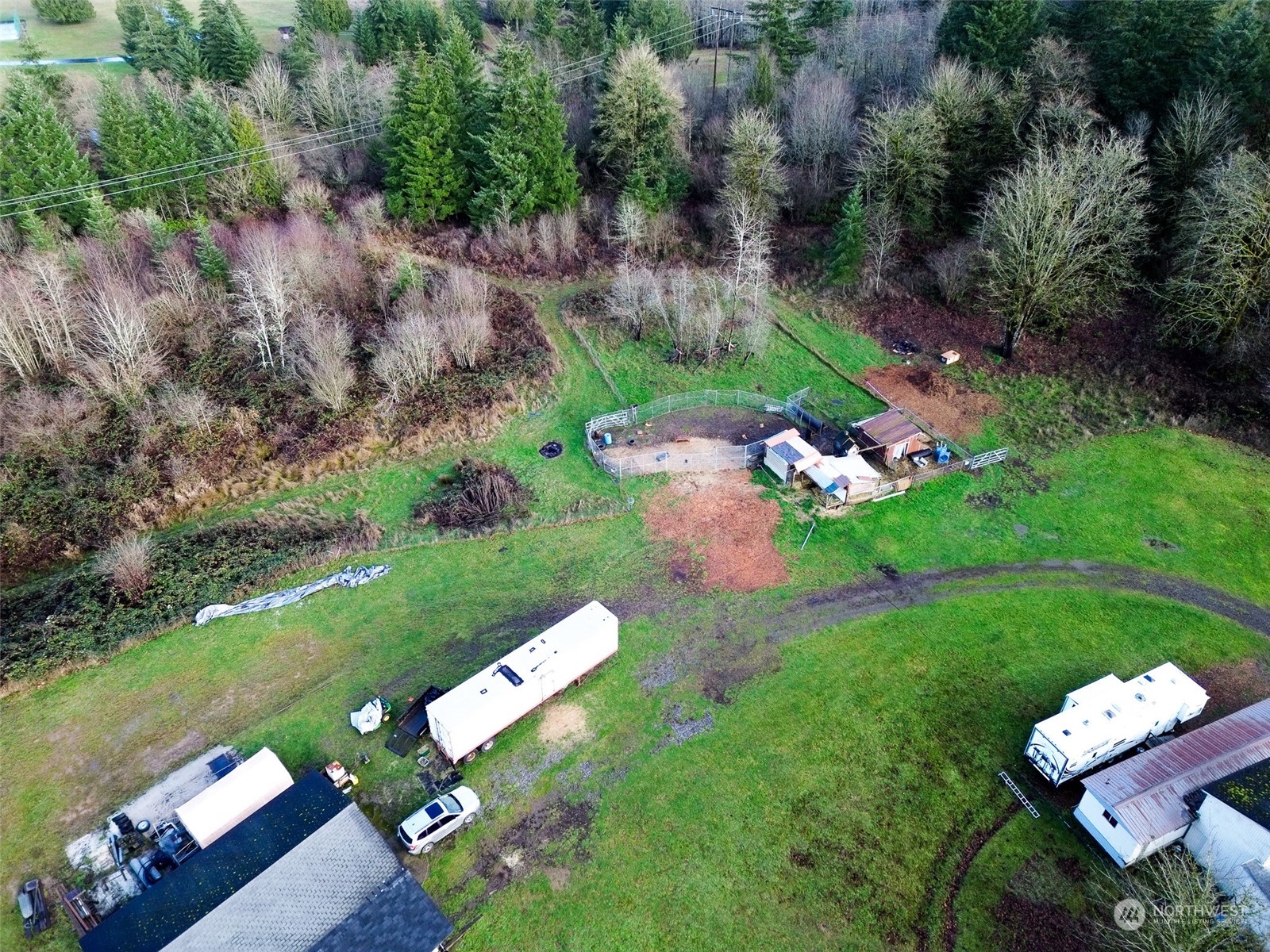 7608 Southwest Scatter View Lane Rochester, WA 98579 - Photo 5 of 23 an aerial view of a house with yard swimming pool and outdoor seating