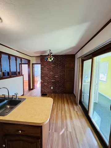 a room with a bed and a large window