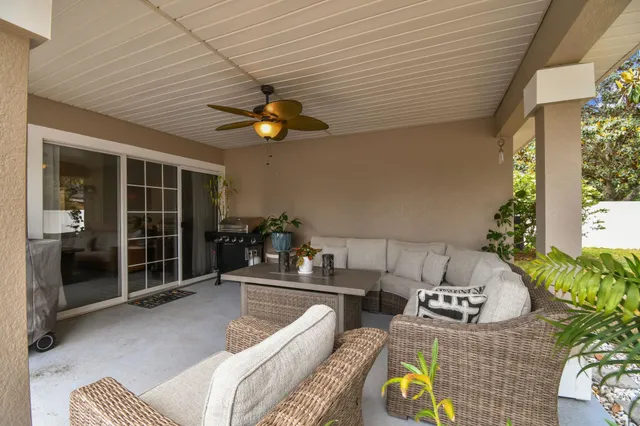 a view of a swimming pool with a yard