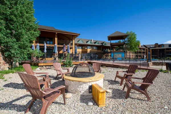 a outdoor space with patio the couches and a potted plant