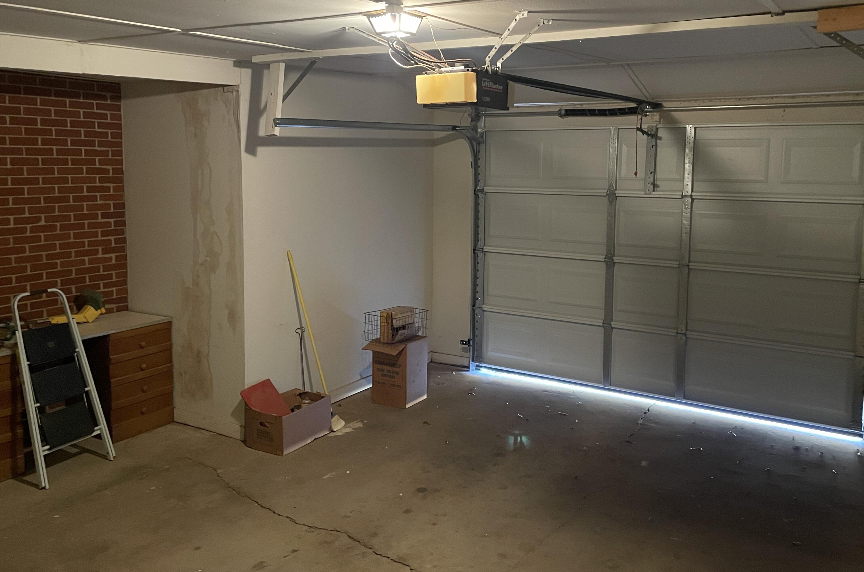 817 North 16th Street Lamesa, TX 79331 - Photo 12 of 12 a view of empty room with wooden floor and fan