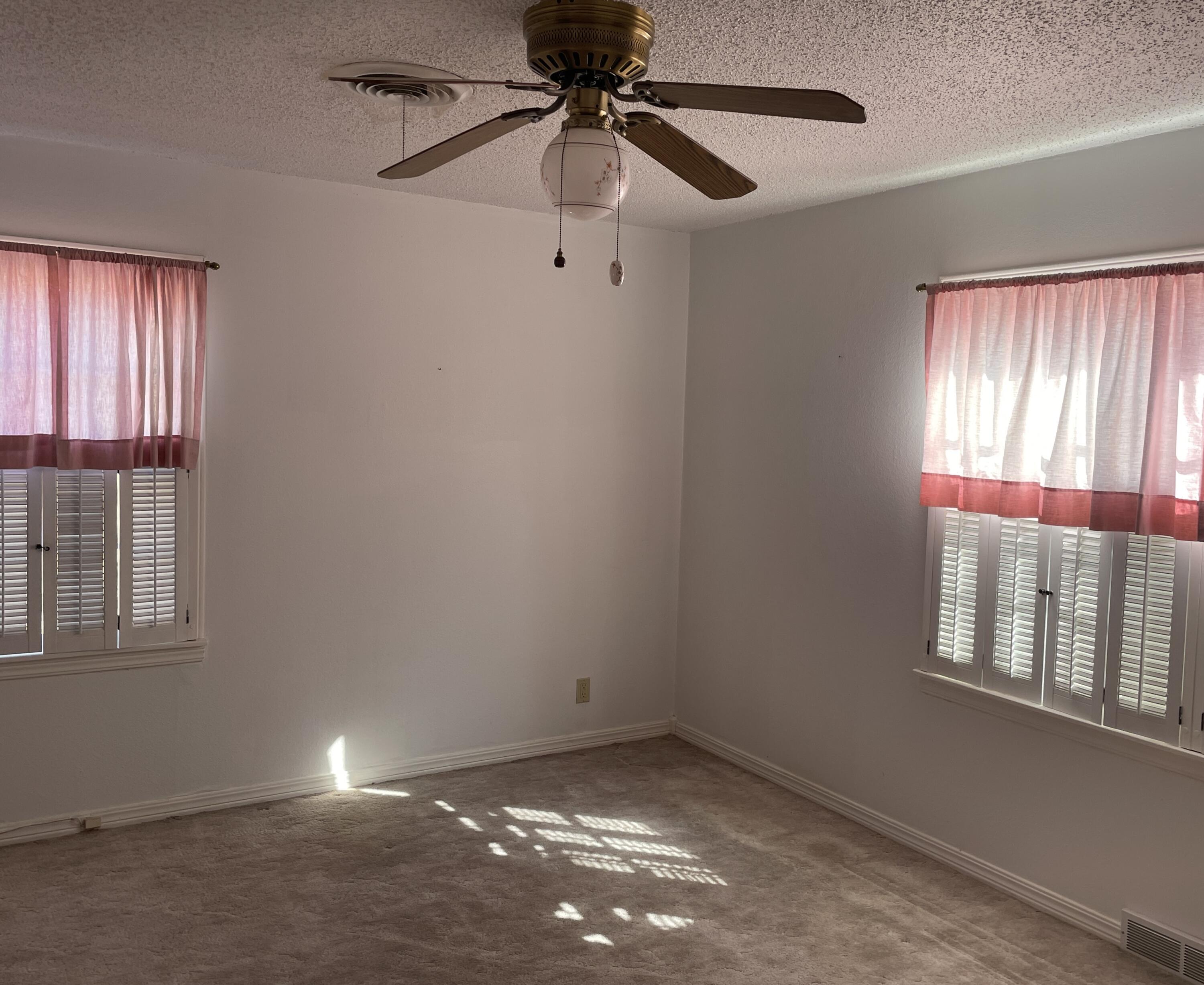 817 North 16th Street Lamesa, TX 79331 - Photo 9 of 12 a view of an empty room with a window