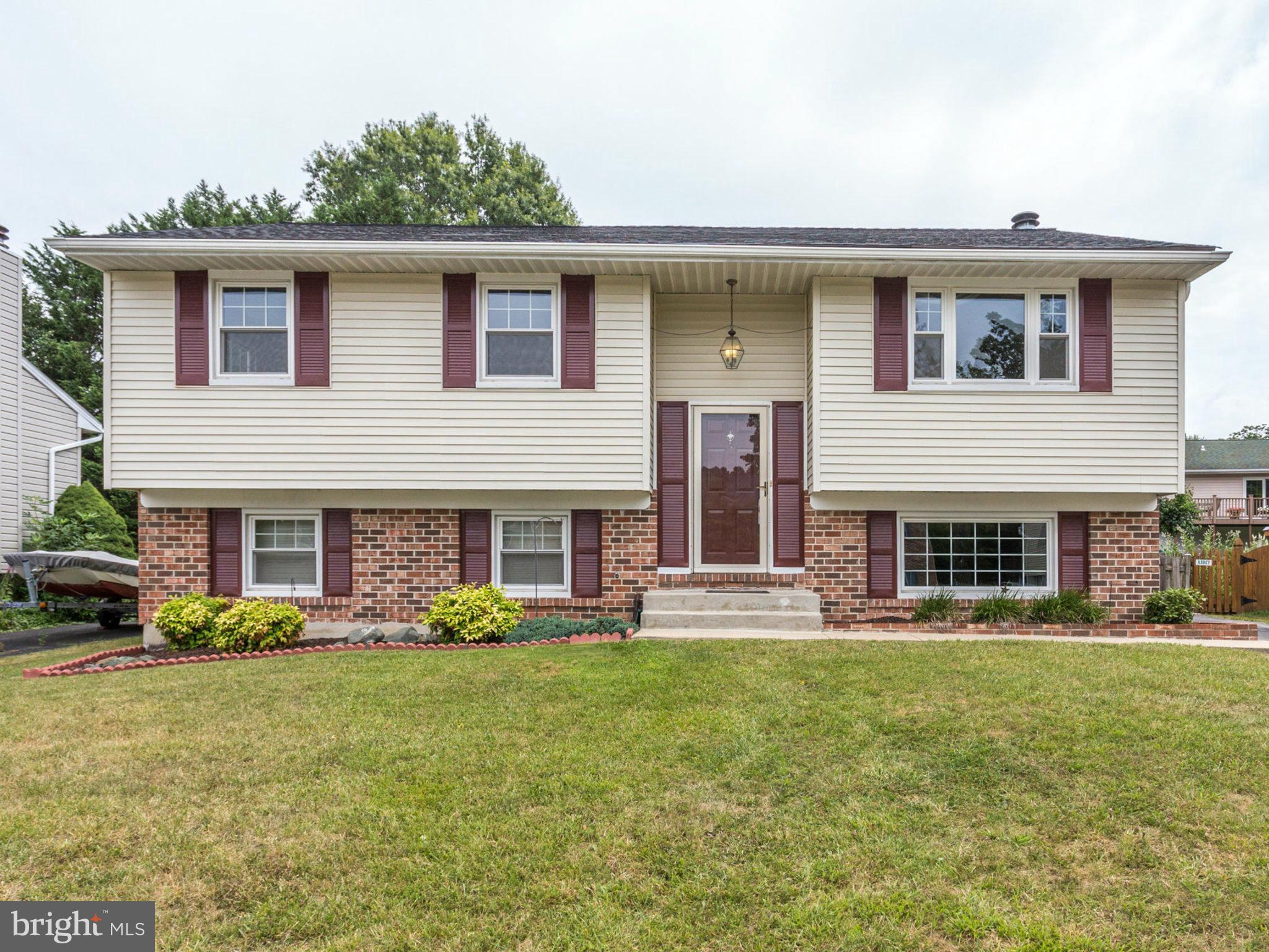 415 Rockway Road Catonsville, MD 21228 - Photo 1 of 30 a front view of house with yard outdoor seating and yard