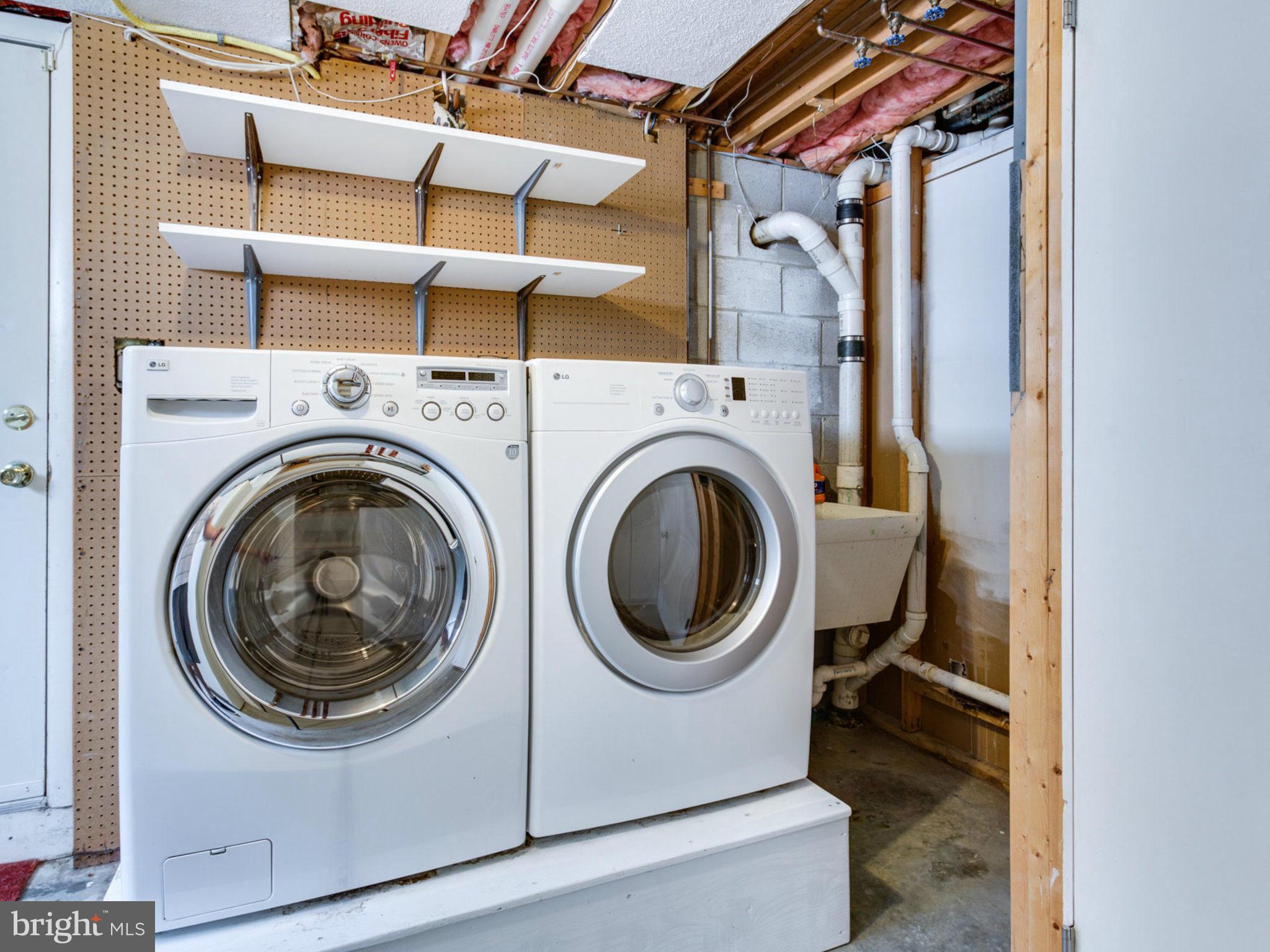 415 Rockway Road Catonsville, MD 21228 - Photo 24 of 30 a utility room with dryer and washer