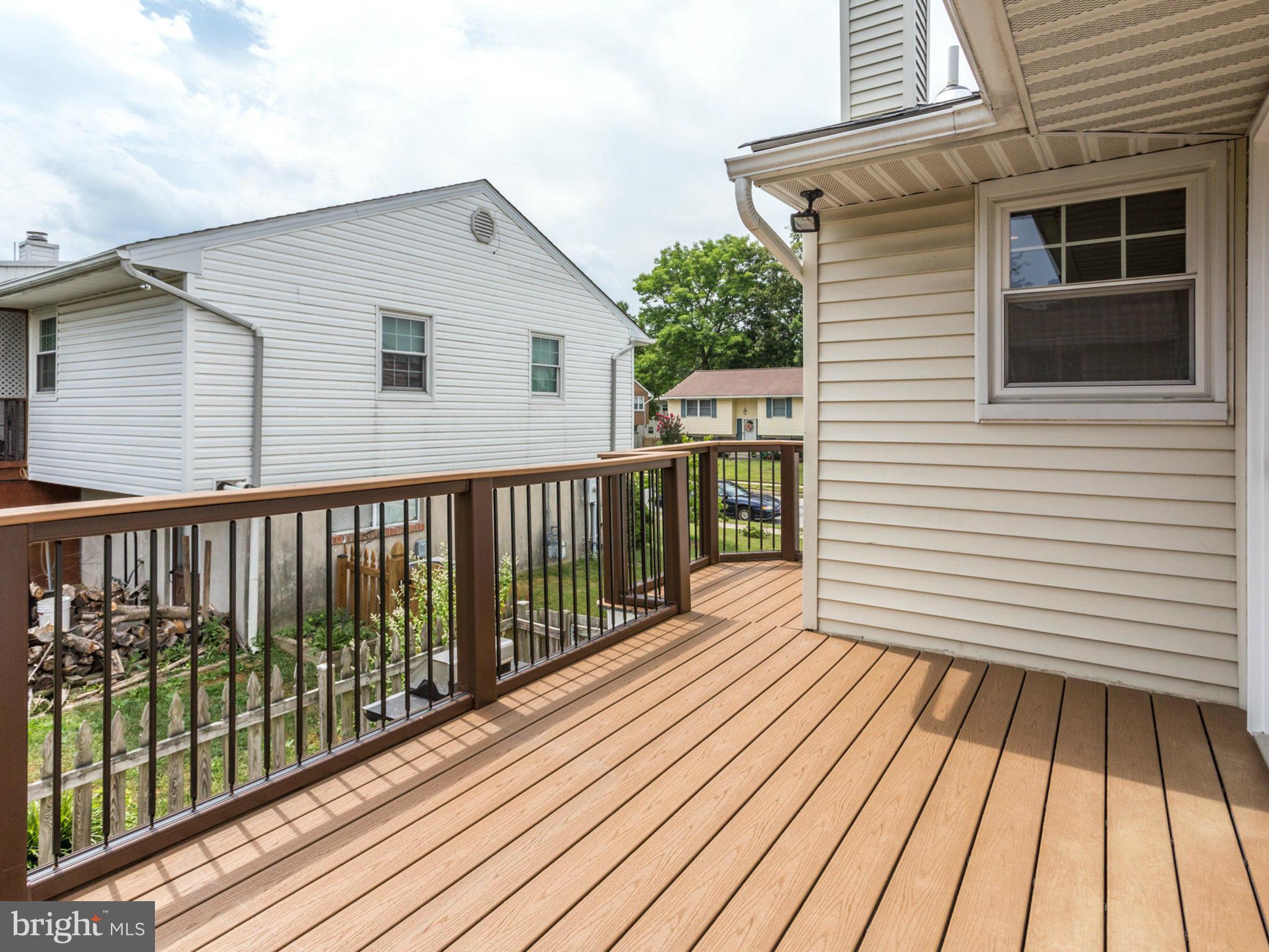 415 Rockway Road Catonsville, MD 21228 - Photo 28 of 30 a view of a wooden deck with large windows
